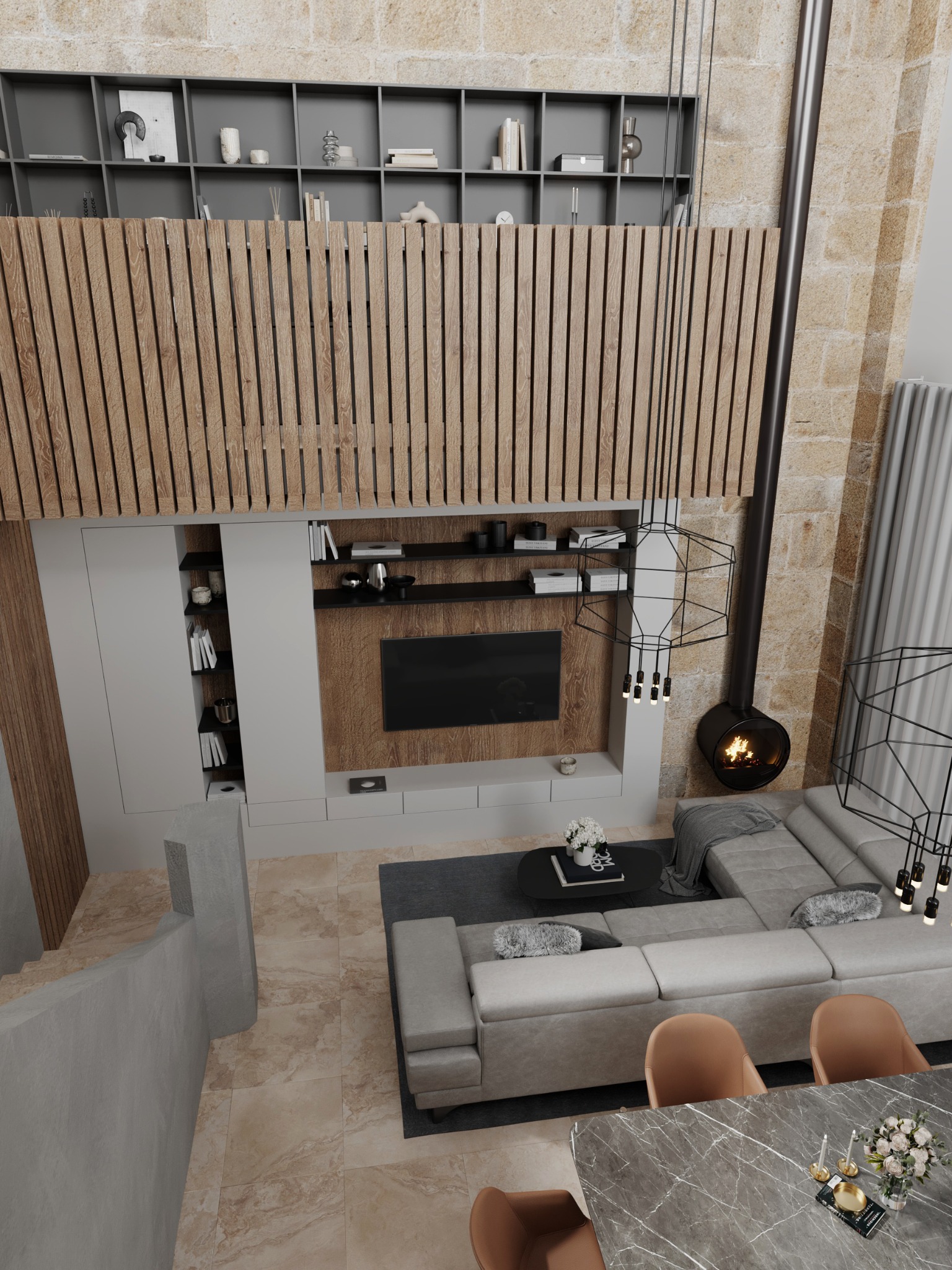 View from the upper level across the double-height living and dining room
