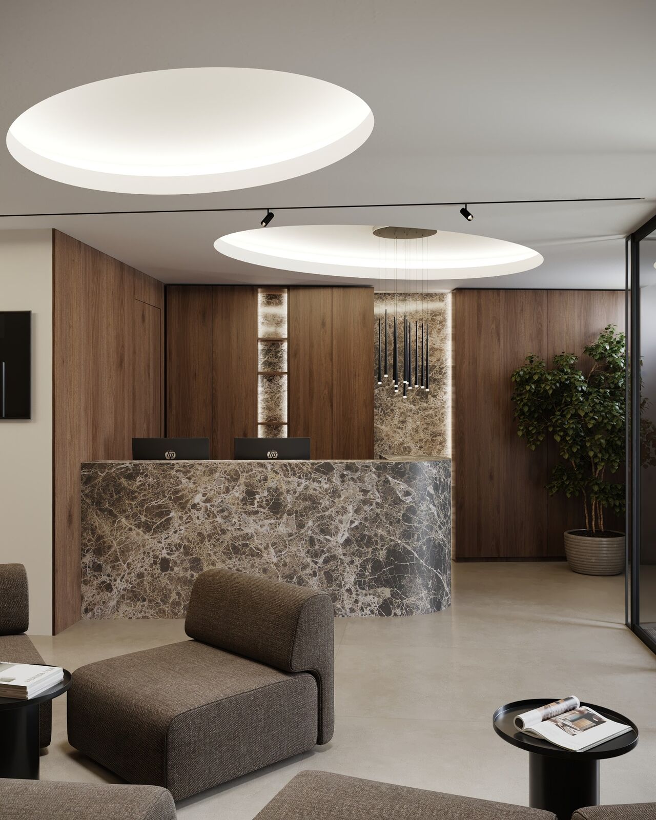 Curved stone reception desk beneath circular ceiling lights
