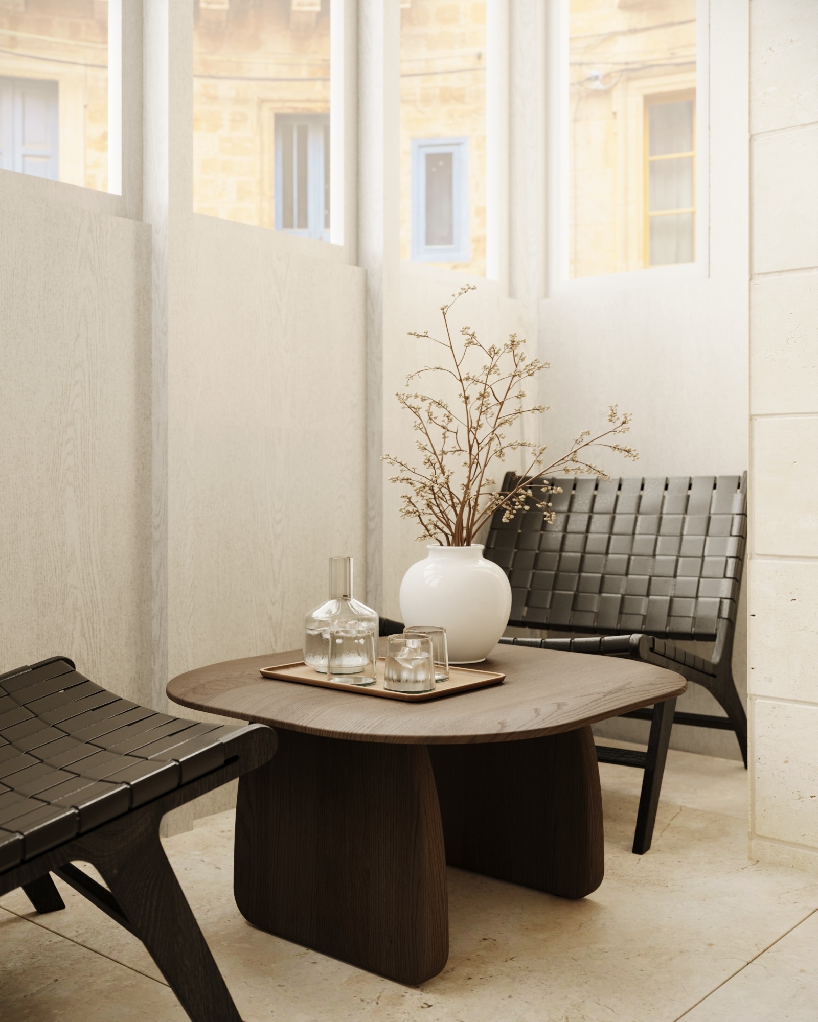 Small courtyard seating area adjoining the boutique hotel kitchenette